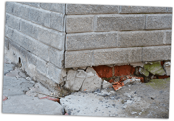 Foundation Repair - Warning Signs. House foundation repair. Foundation Repair. Broken Foundation House Brick Wall.