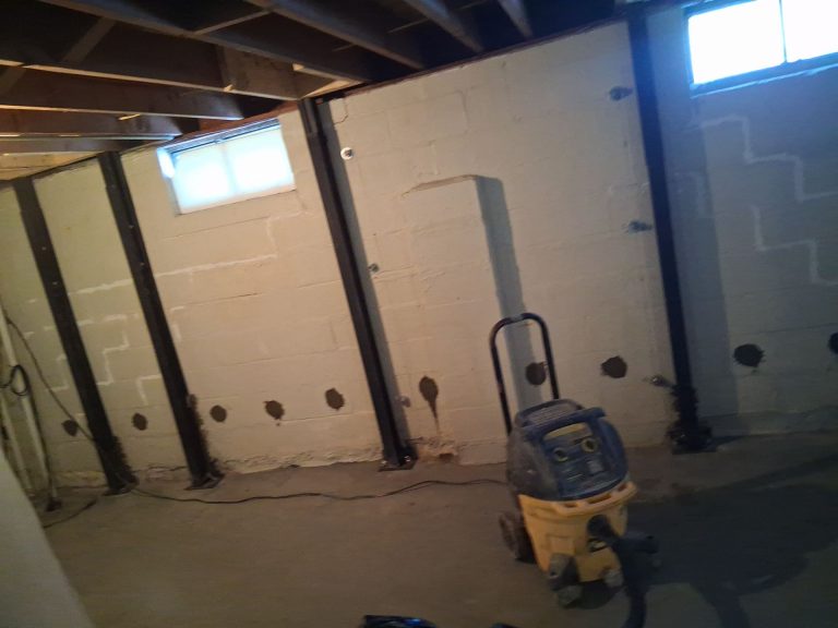 Basement foundation repair in Maumee OH with steel beam wall reinforcements and crack repair